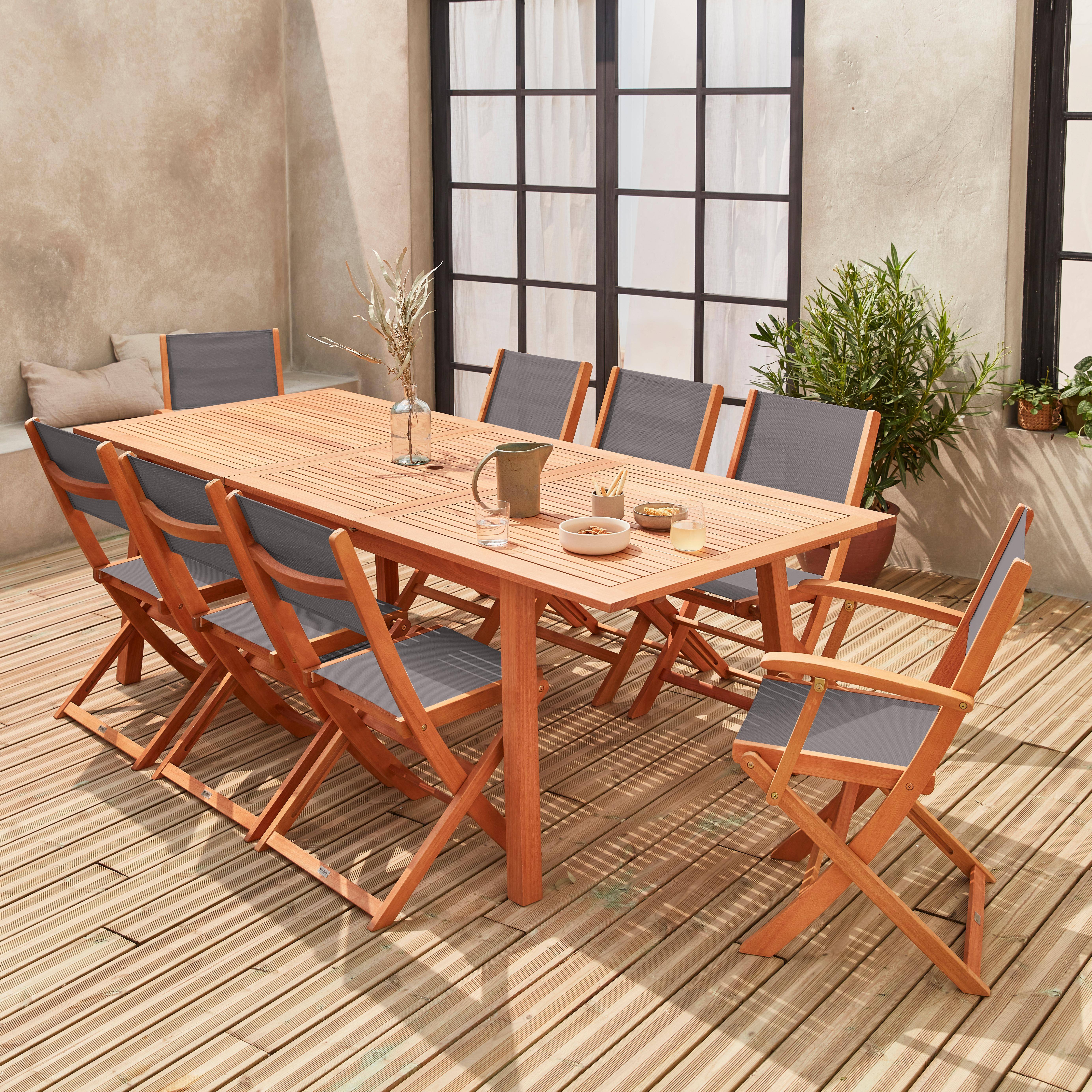 Ausziehbare Gartengarnitur aus Holz - Almeria - Großer Tisch 180/240 cm mit Verlängerung, 2 Sesseln und 6 Stühlen aus geöltem FSC-Eukalyptusholz und anthrazitfarbenem Textilene Photo1
