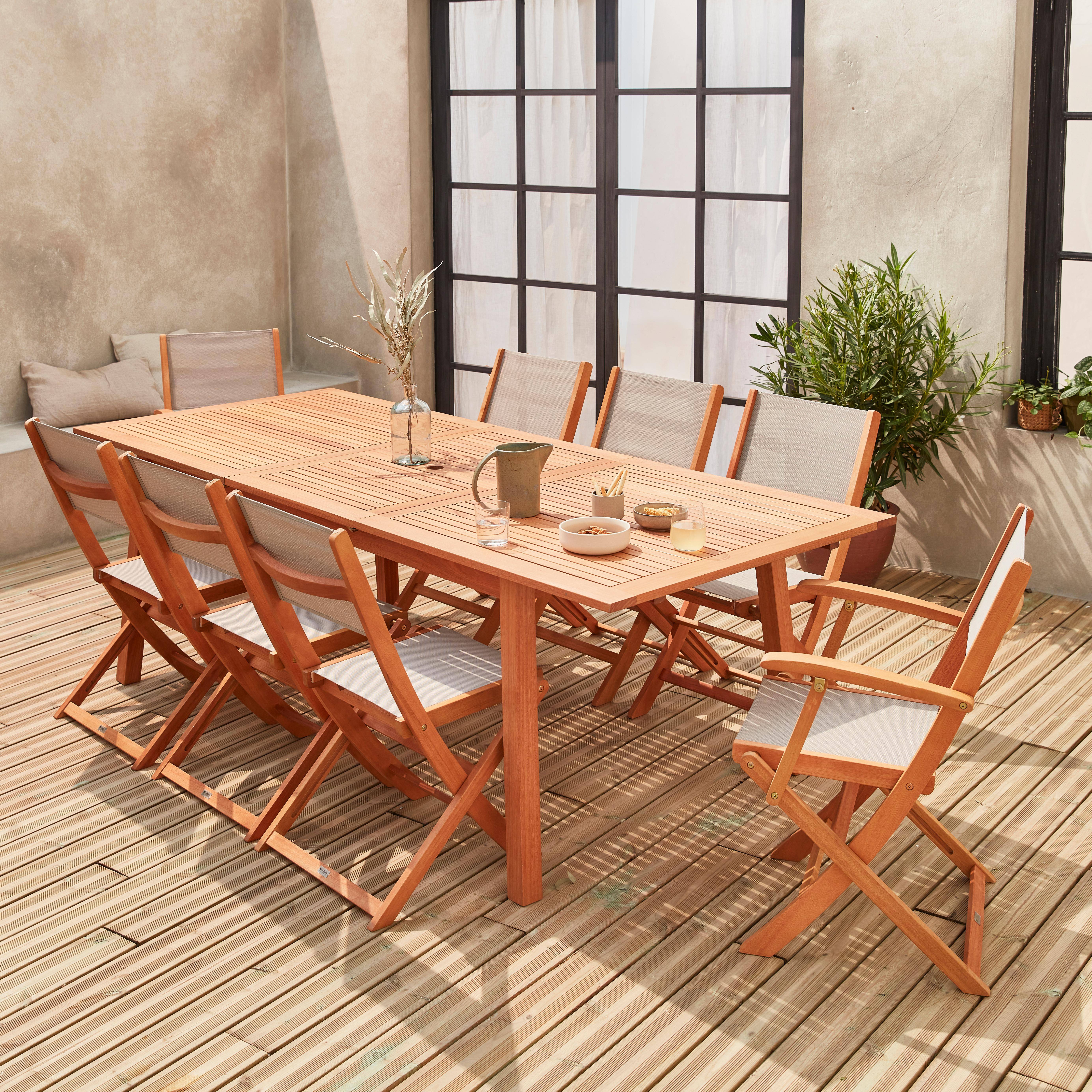 Ausziehbare Gartengarnitur aus Holz - Almeria - Großer Tisch 180/240 cm mit Verlängerung, 2 Sesseln und 6 Stühlen aus geöltem FSC-Eukalyptusholz und taupegrauem Textilene Photo1