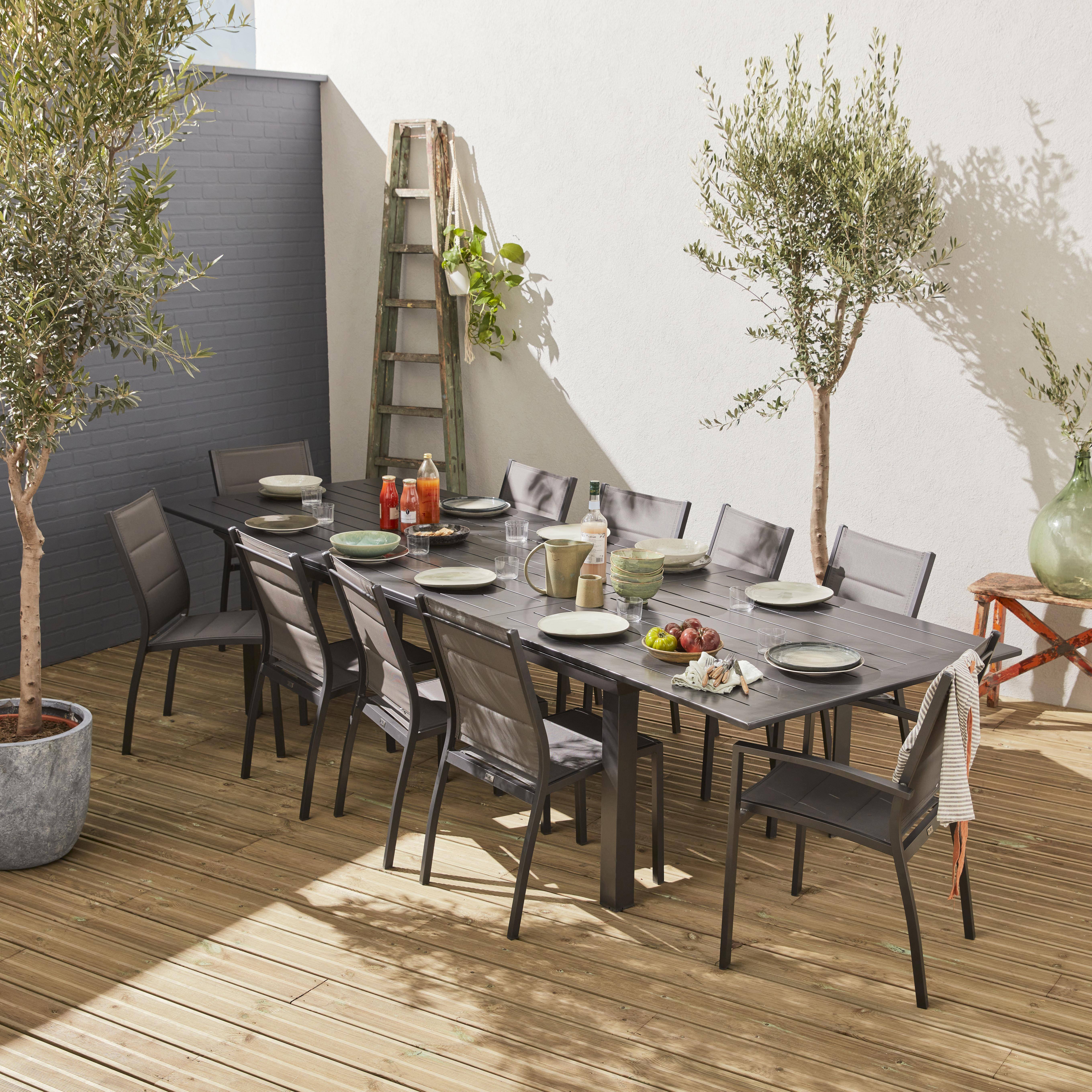 Ensemble Odenton, 1 table extensible, 2 fauteuils, 8 chaises en aluminium et textilène Photo1